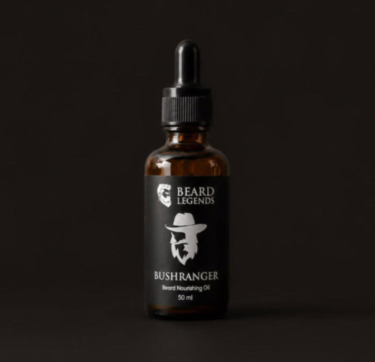 Man grooming a patchy beard with Beard Legends beard oil